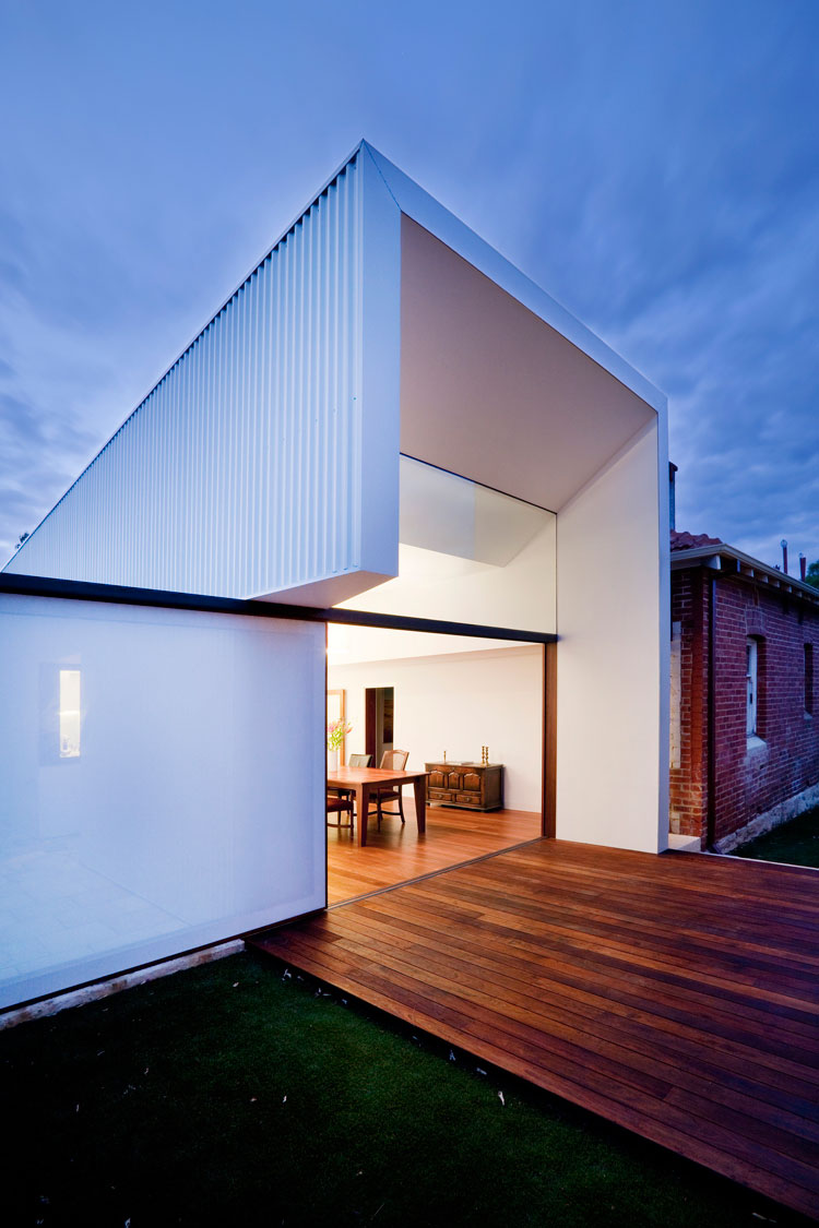 To the North a sliding door and clerestory window open to the light and the deck at Westbury Crescent Residence