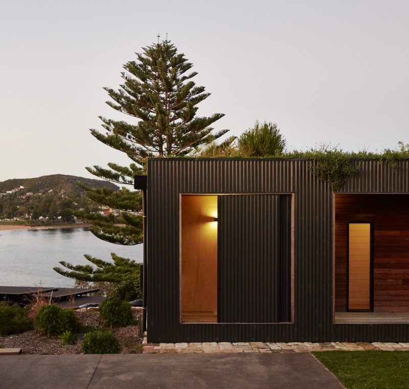 This Green Roofed Beach House Arrived on the Back of a Truck