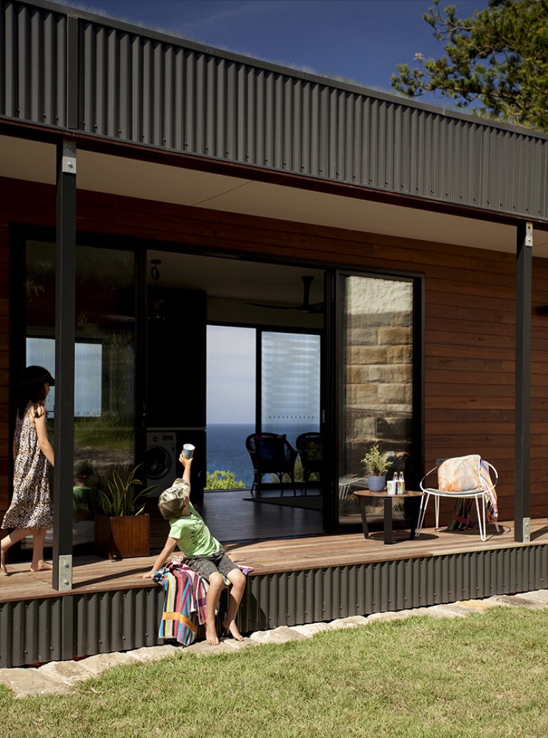 This Green Roofed Beach House Arrived on the Back of a Truck