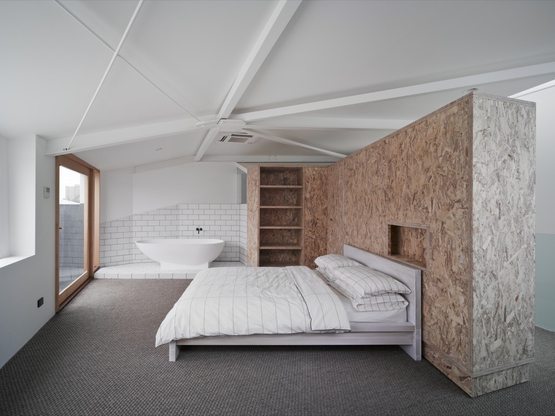 In the bedroom a large wardrobe can pivot out of the way to create a second bedroom or study area to make the most of Cubby House's small space