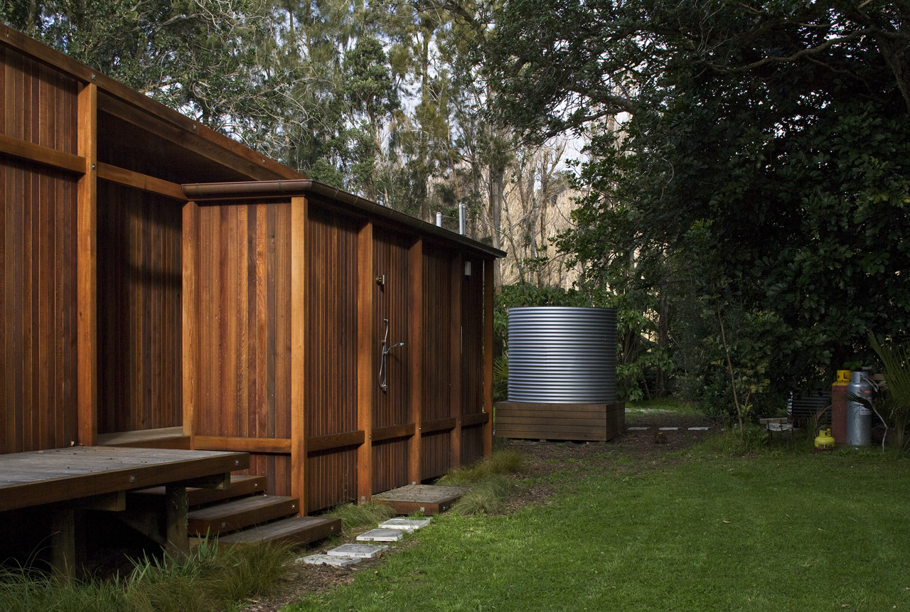 Great Barrier House's Skeletal Timber Frame Allows it to Open Up