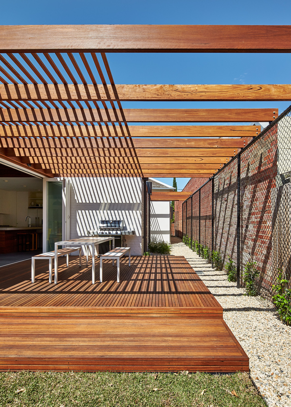 Rich Materials and Light-Filled Courtyards Connect Old to New