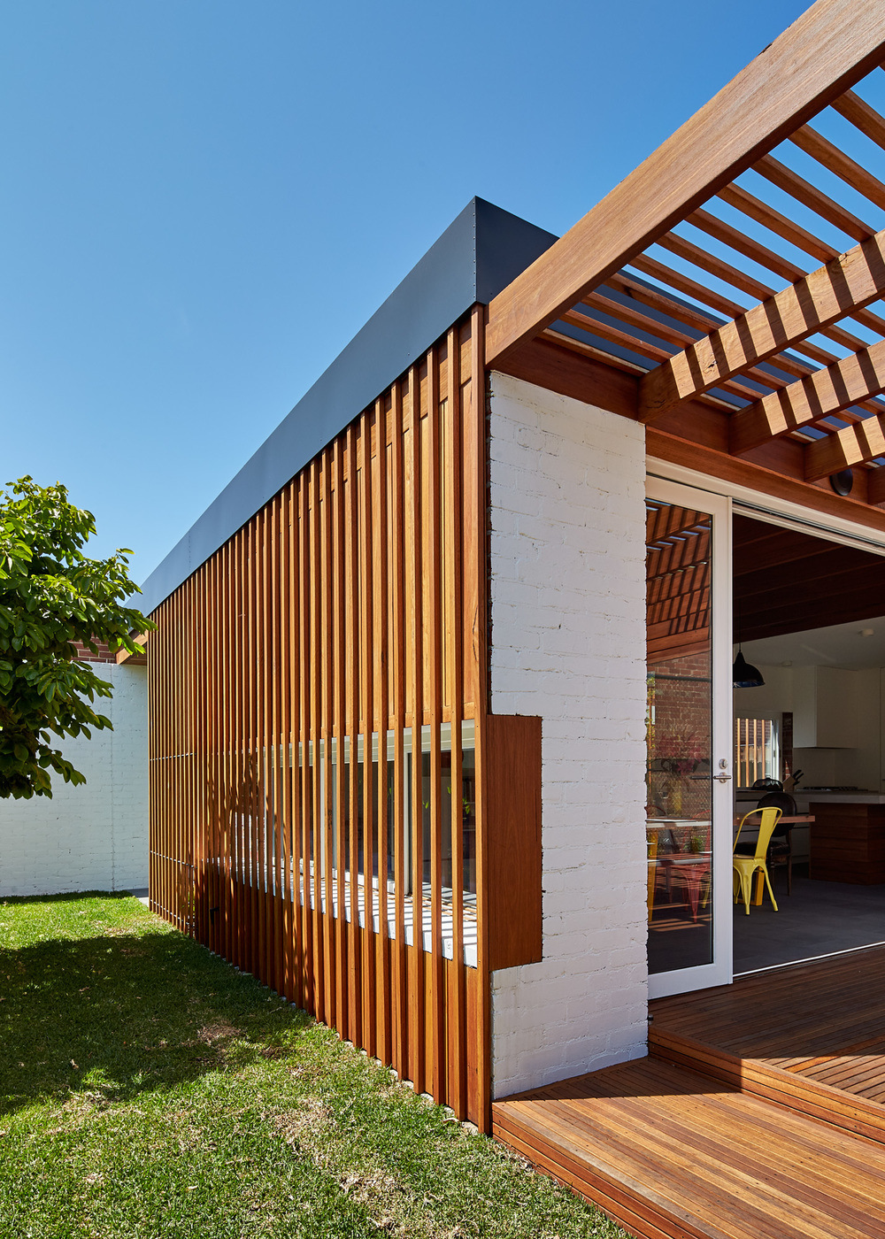 Rich Materials and Light-Filled Courtyards Connect Old to New