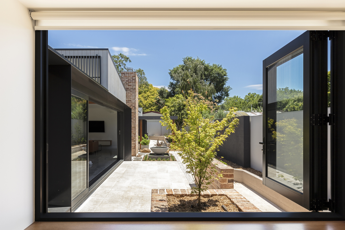 North Facing Living Spaces Provide Space and Light to This Home