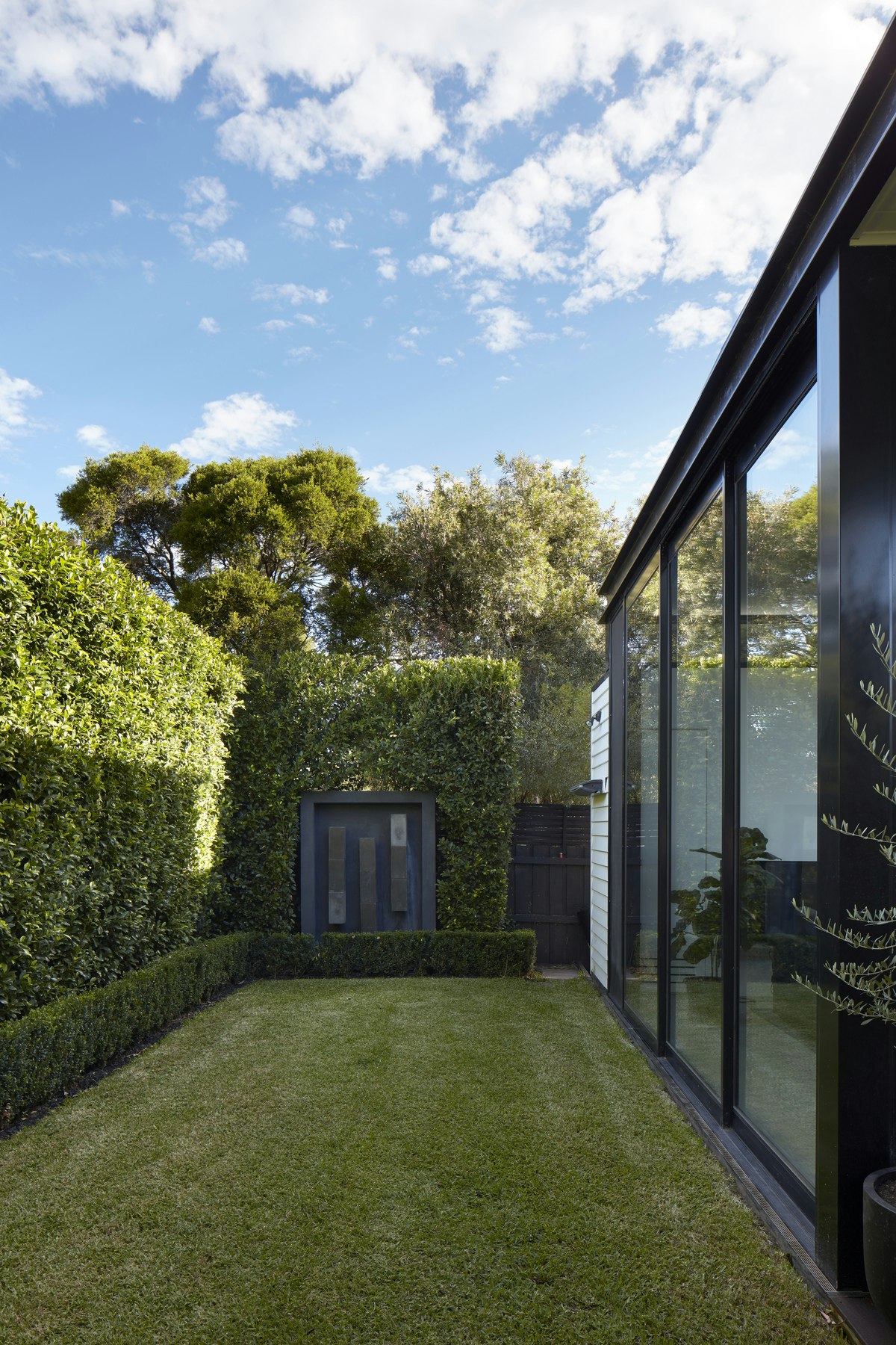 A Garden Pavilion Nestled in this Backyard Brings the Outdoors In